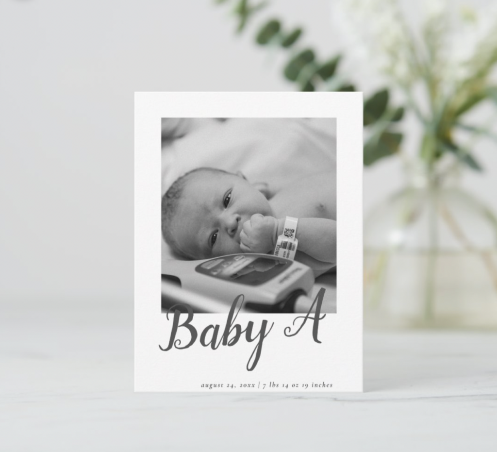 A birth announcement postcard with one baby image on the front