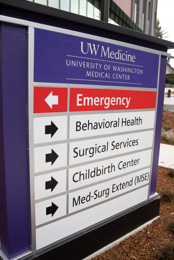 UW Medicine sign showing where the Childbirth Center is with an arrow pointing.