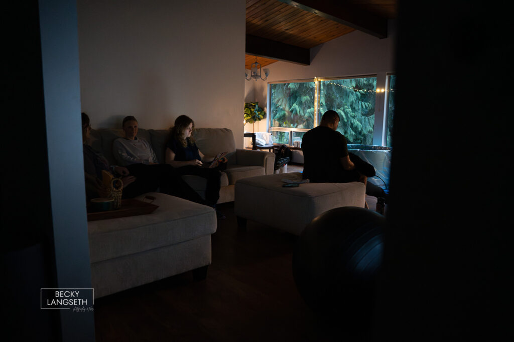 birth team sitting on the couch patiently waiting for labor to progress