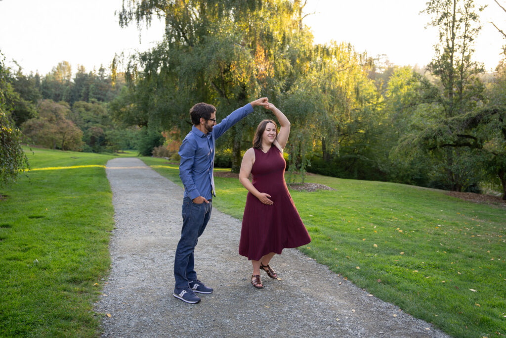 A couple dancing on the path at Washington Park Arboretum